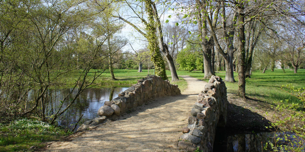 Old stone bridge in the palace garden.