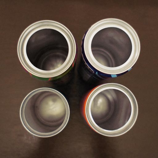 Soda cans with smooth edges.