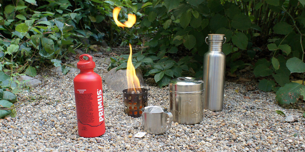 Making tea with a DIY alcohol stove.